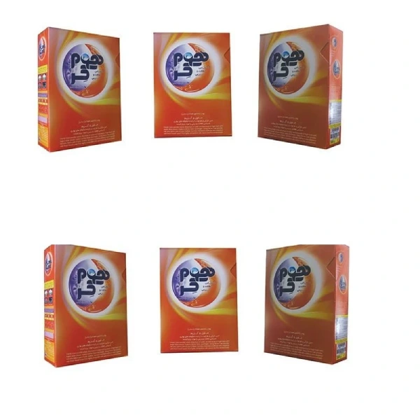 شش بسته پودر لباسشویی هوم کر با طراحی نارنجی، سفید و آبی، چیدمان سه در دو در پس زمینه سفید.